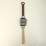 Flat lay of the Diamond Leather Apple Watch Band in Apricot and Dark Brown two-tone leather.