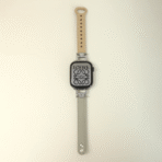 Modern Grey and Apricot Diamond Leather Apple Watch Band highlighting its unique two-tone color blocking design.