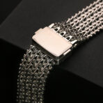 Detailed view of stainless steel clasp on Woven Metal Strap