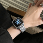 Chic lifestyle view of silver quilted metal link bracelet for Apple Watch