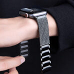 Adjusting a black Stainless Steel Mesh Apple Watch Band with magnetic closure