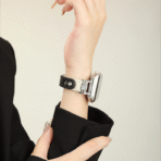 Stylish black and cream Diamond Leather Apple Watch Band worn on a wrist for a luxury minimalist aesthetic.