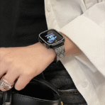 Fashionable quilted texture and crystal inlay detail on metal watch band